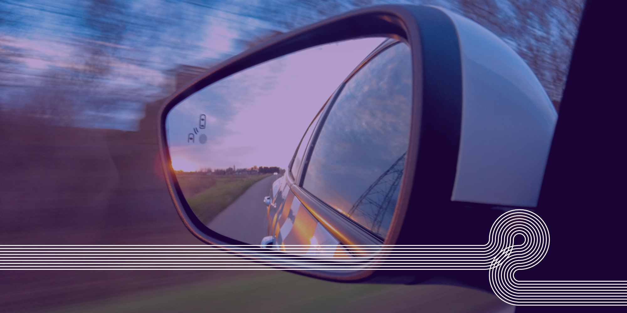 Looking back in a rear view mirror is symbolic of looking back on 2023